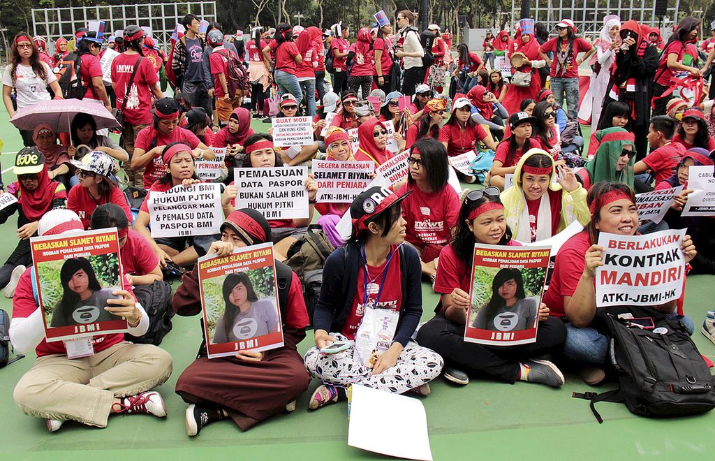 Pekerja migran Indonesia saat memperingati Hari Buruh, Minggu (1/5/2016), di Taman Victoria, Hong Kong.