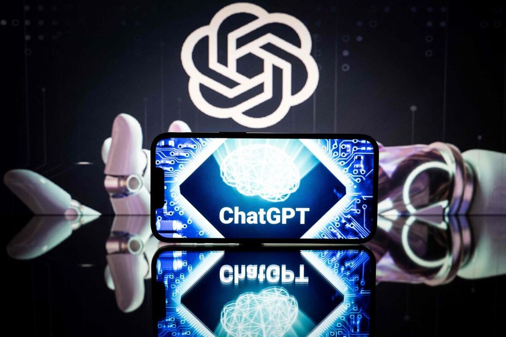 Logo <i>chatbot</i> kecerdasan buatan ChatGPT dan lembaga yang mengembangkannya, Open AI, terpampang dalam layar pada 23 Januari 2023. Sejak kemunculannya pada November 2022, ChatGPT menggemparkan dunia teknologi. 