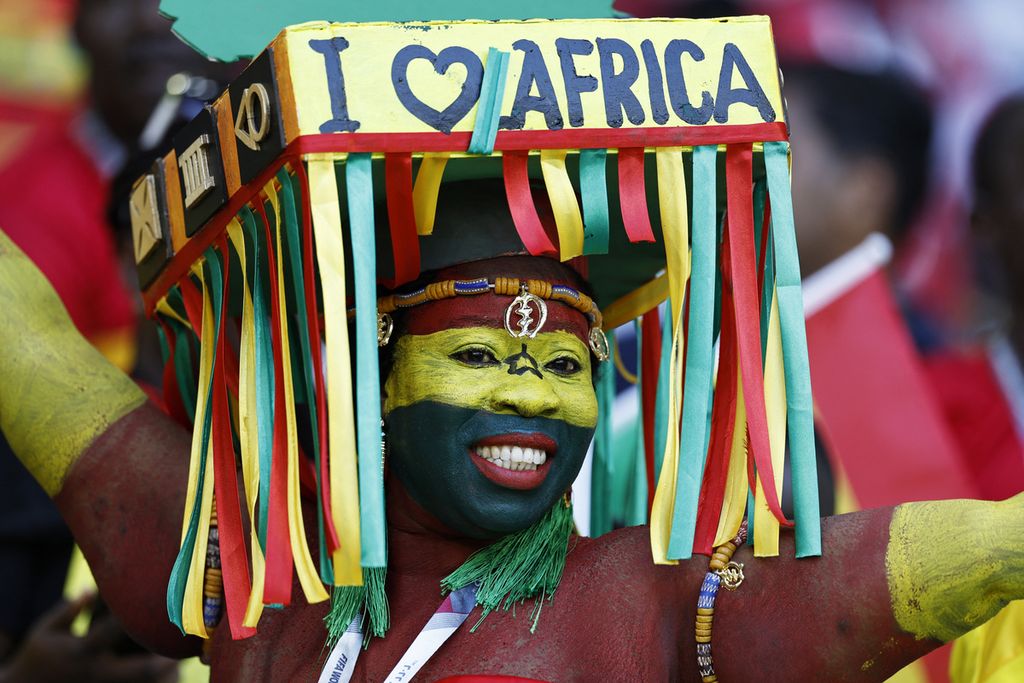 A Ghana fan attends the Qatar 2022 World Cup Group H football match between South Korea and Ghana at the Education City Stadium in Al-Rayyan, west of Doha, on November 28, 2022.