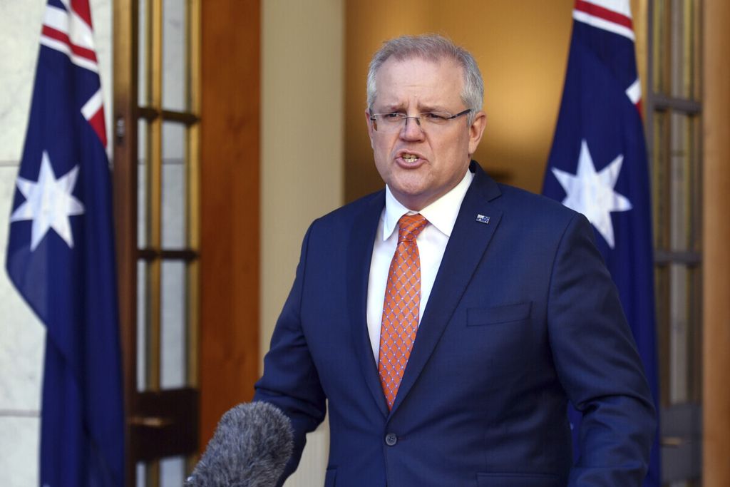 Perdana Menteri Australia Scott Morrison dalam jumpa pers di Canberra, Kamis (9/7/2020).         