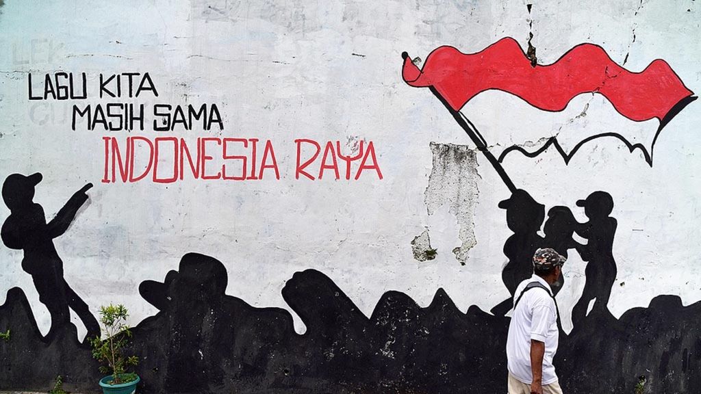 Polarisasi yang terjadi di masyarakat akibat pilkada menggerakkan sekelompok warga untuk mengampanyekan persatuan melalui mural. Salah satunya seperti terlihat di kawasan Cipayung, Tangerang Selatan, Banten, Sabtu (20/1/2018). 