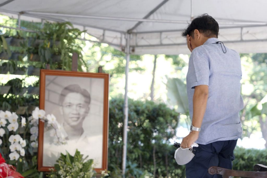  In this photo provided by the Office of Ferdinand Marcos Jr., Presidential candidate Ferdinand "Bongbong" Marcos Jr. visits the tomb of his father at the National Heroes Cemetery in Metro Manila, Philippines, on Tuesday May 10, 2022. Marcos, the namesake son of longtime dictator Ferdinand Marcos, apparent landslide victory in the Philippine presidential election is raising immediate concerns about a further erosion of democracy in Asia and could complicate American efforts to blunt growing Chinese influence and power in the Pacific.